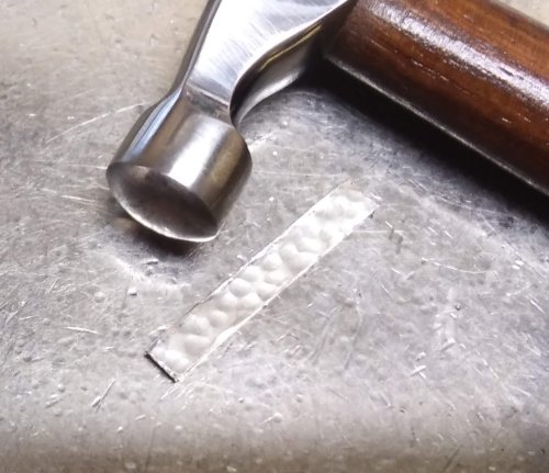 Judy Larson's Ripple Bracelet  - , Metalwork, Cutting, Cutting Tool, Cutters, Dapping, Dapping Jewelry, Filing, Finishing, Findings, Clasps, Components, Tumbling, Tumble, Tumbling Jewelry, Butane Torch, Soldering, Solder, Tools,  Place the T-bar on a bench block.